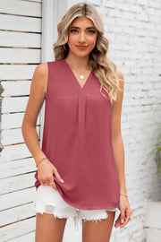 Burgundy sleeveless V-neck blouse with textured fabric and front pleats