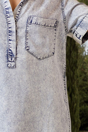 Acid wash shirtdress in light denim with contrast stitching and a chest pocket.