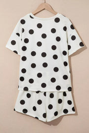 White polka dot loungewear set with crew neck top and shorts.
