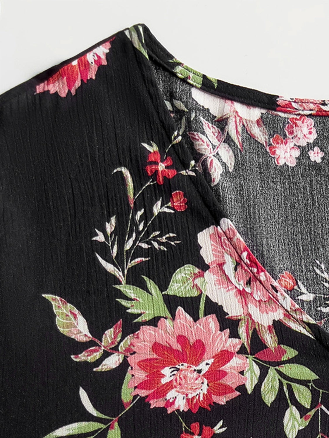 Black floral print viscose maxi dress with V-neck and bell sleeves detail