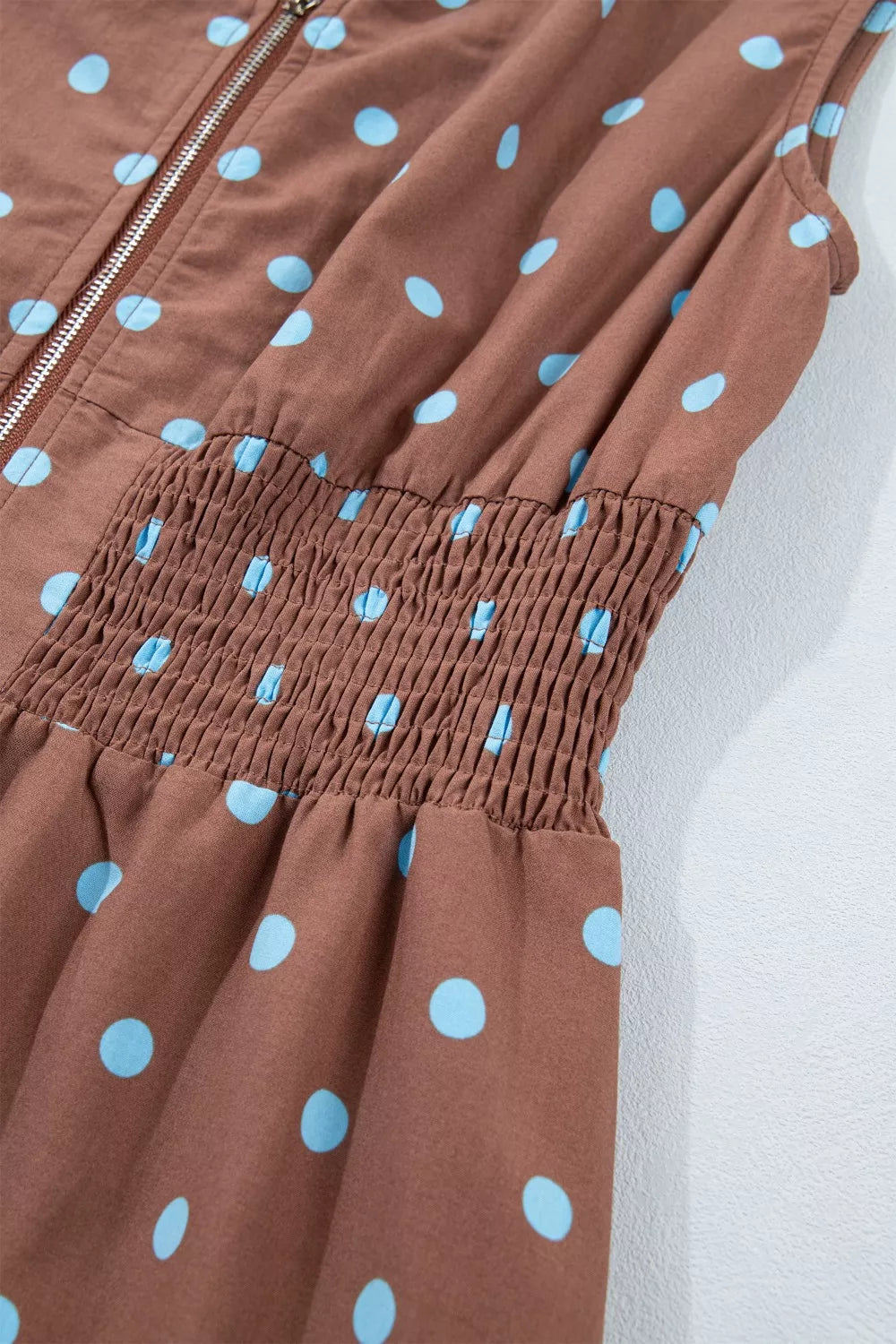 Taupe polka dot midi dress with smocked waist and zipper detail