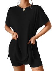 Black drape front tee with side slits and matching shorts.