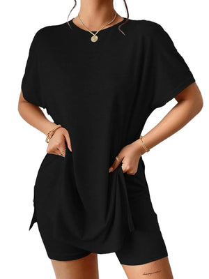 Black drape front tee with side slits and matching shorts.