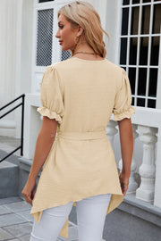 Light Yellow Dotted Swiss Asymmetric Hem Blouse with puff sleeves and tie waist