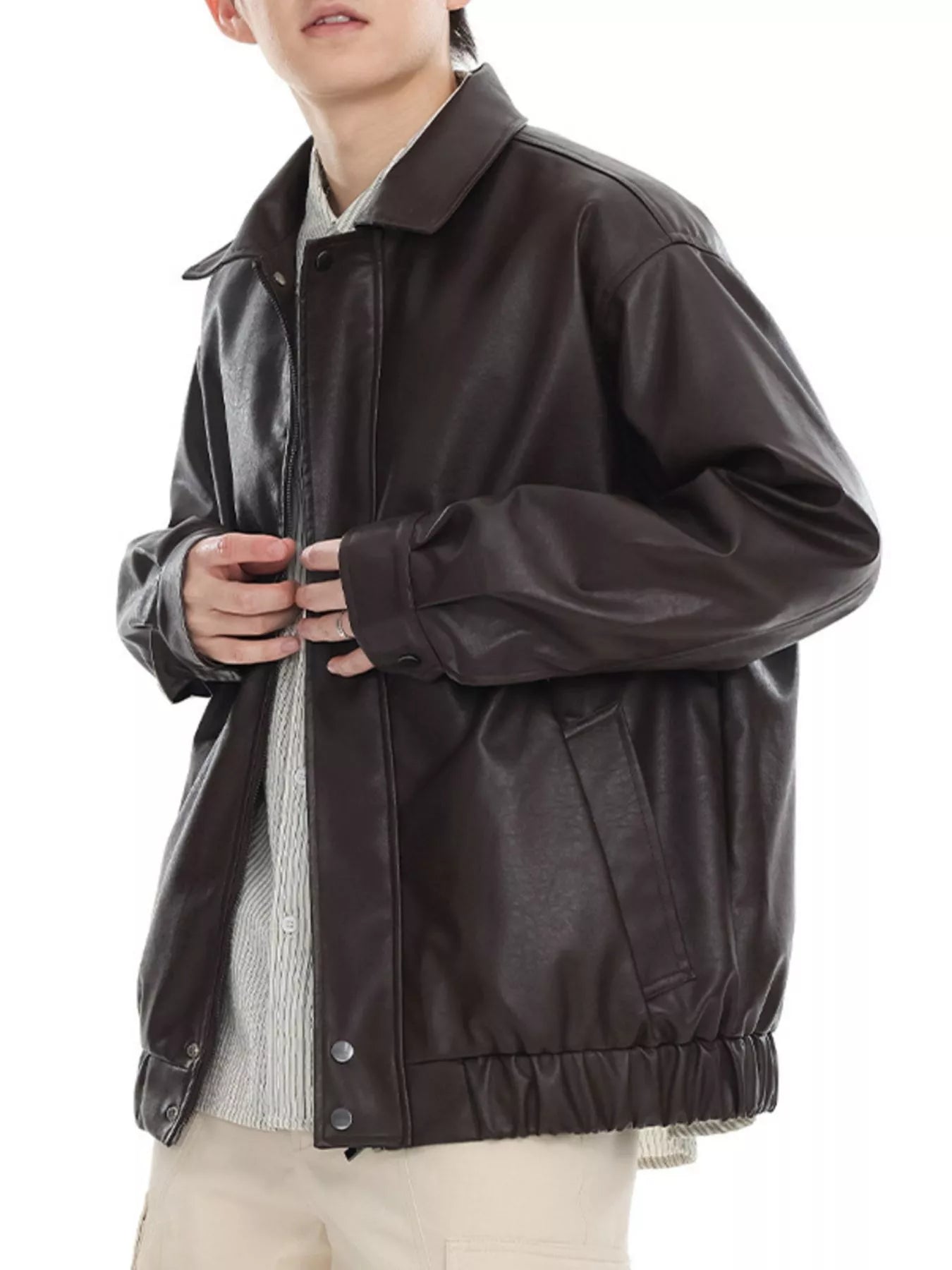 Brown faux leather bomber jacket with collared neckline and elasticated hem.