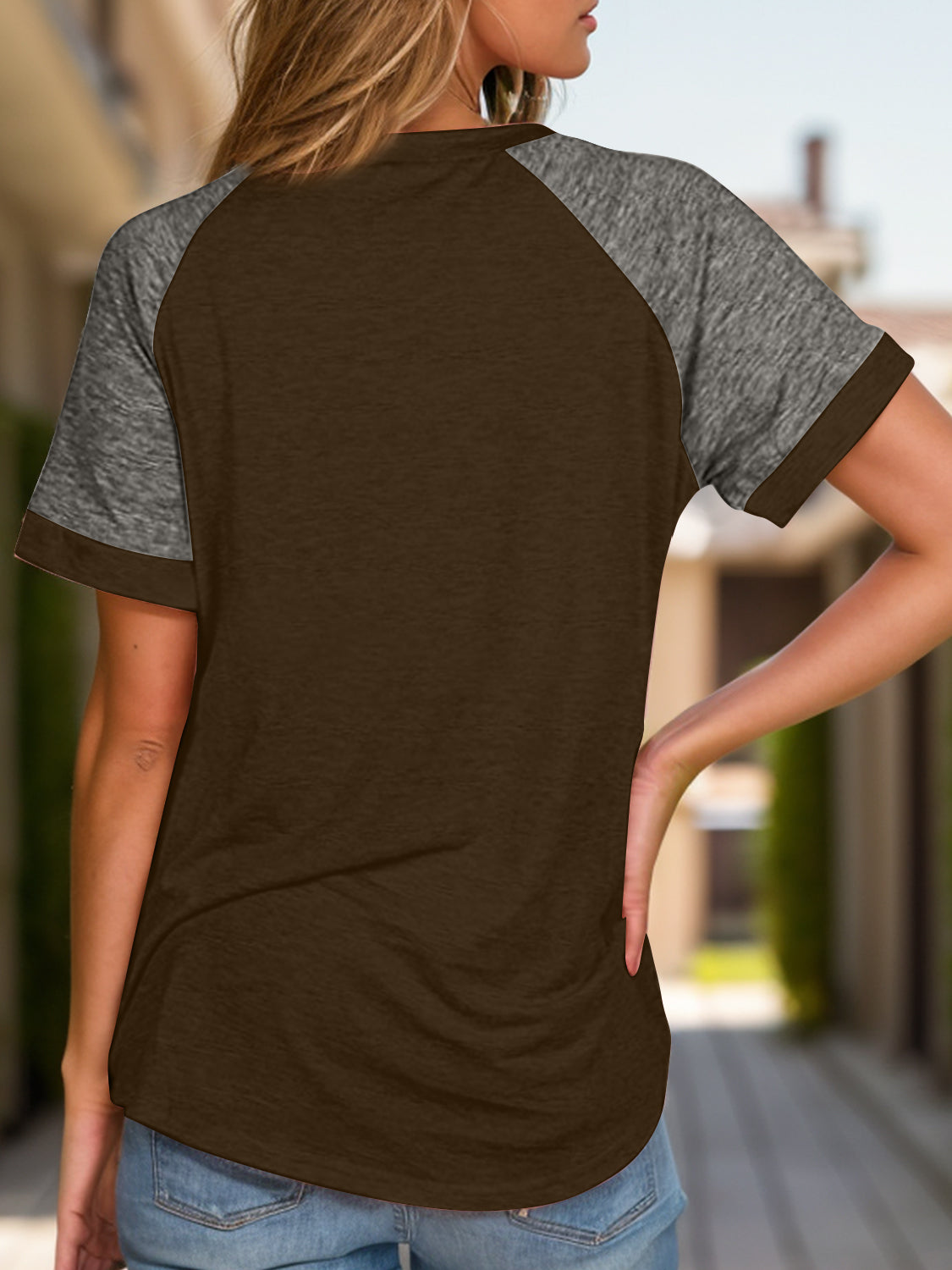 Raglan sleeve tee in dark brown with heather gray sleeves and crew neck.