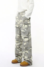Oversized camo utility cargo pants in gray with multiple pockets.