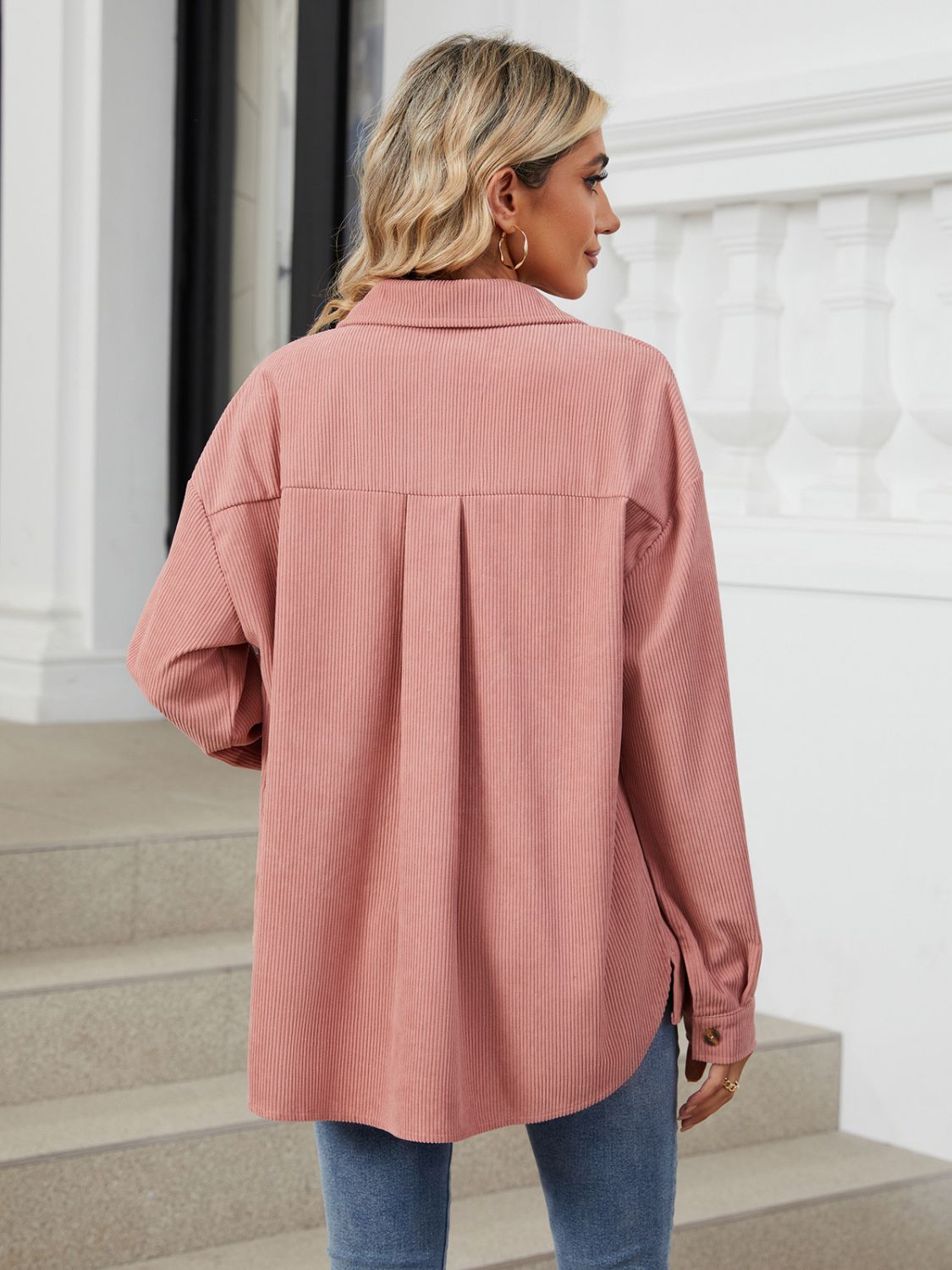 Dusty pink corduroy overshirt with back pleat detail and buttoned cuff.