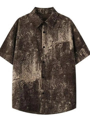 Men's oversized short sleeve shirt in coffee brown with abstract floral print.