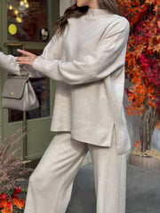 Relaxed fit knit co-ord set in Dust Storm with mock neck and side slits.