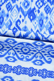 Royal blue ikat print blouse with border trim detail