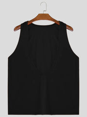 Black deep plunge tank top with wide straps and a U-neckline.