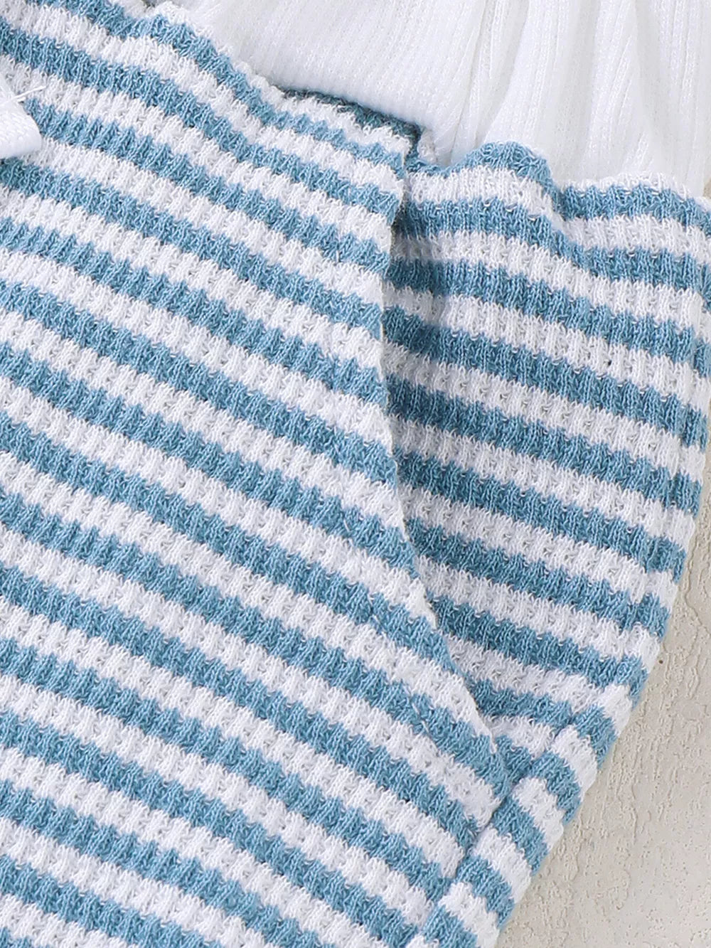Baby blue and white striped waffle knit tee and shorts set with white trim.