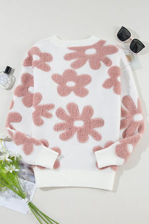 Textured floral knit pullover sweater in white with pink flowers, crew neck, long sleeves.