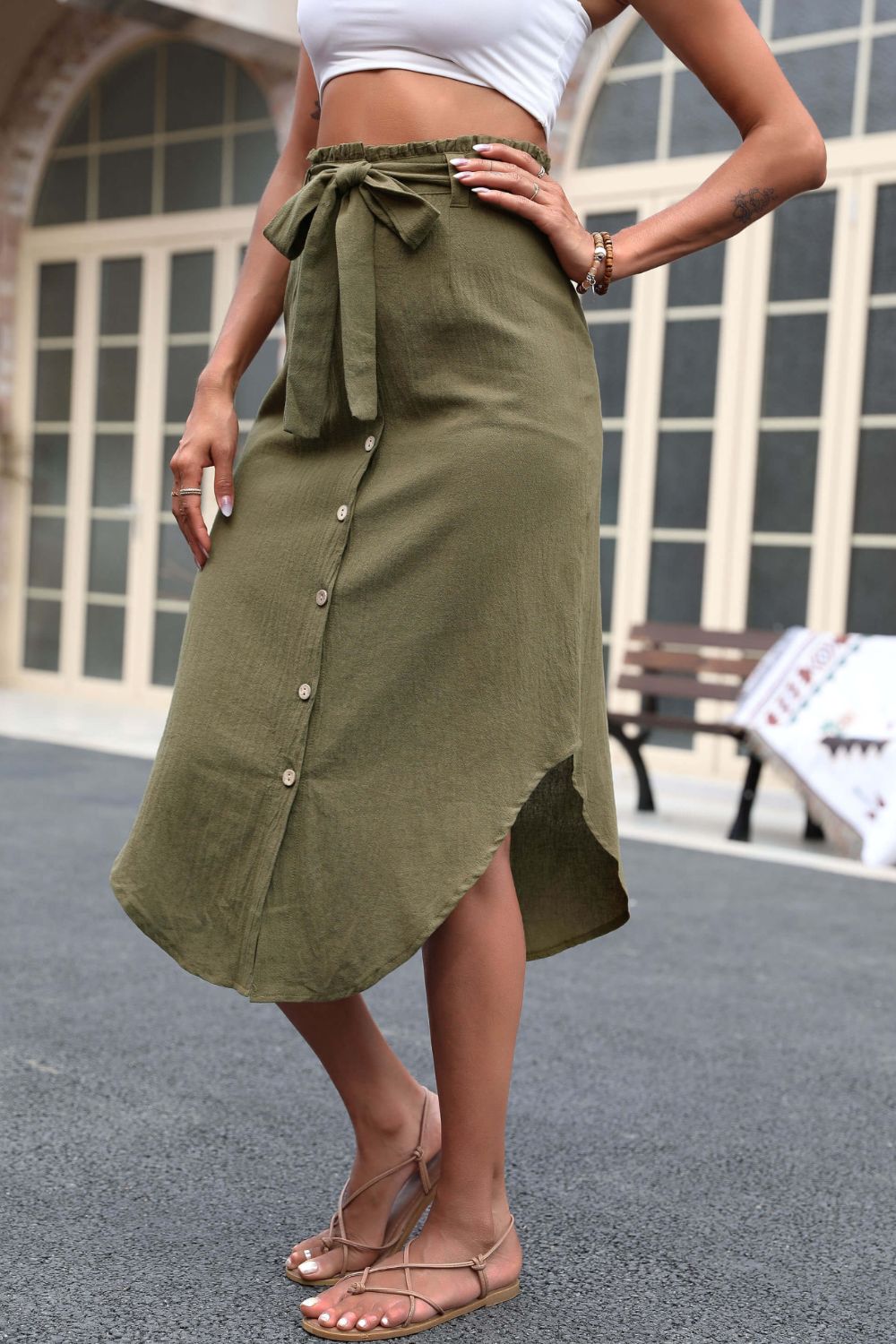 Olive asymmetric midi skirt with button-down front and tie waist