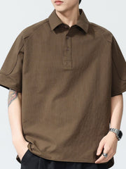 Brown textured short sleeve polo shirt with button-down collar and two-button placket.