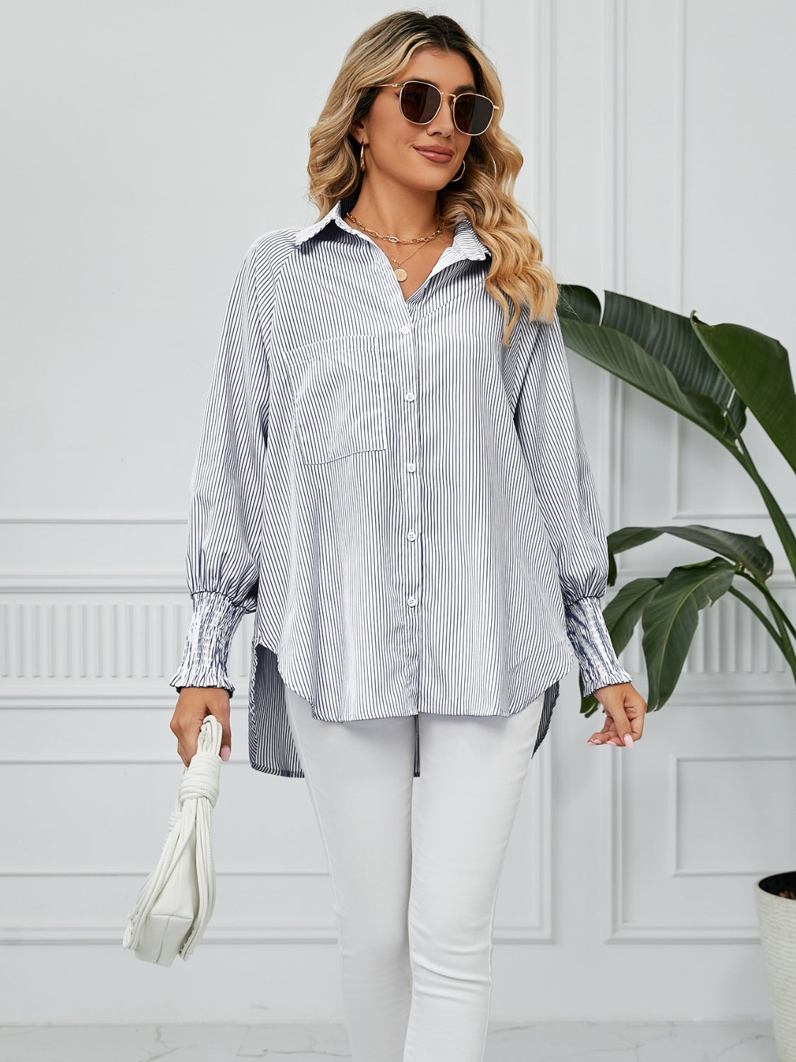 Balloon sleeve stripe shirt with button-up front and smocked cuffs.