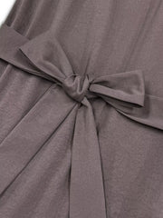 Elegant midi dress in coffee brown with a tie waist detail and ruffle hem.