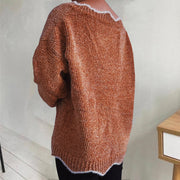 Caramel knit sweater with scalloped trim and textured acrylic fabric.