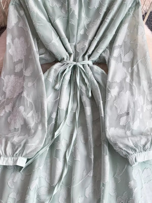 Light Green embroidered tie-waist dress with sheer floral sleeves and cinched waist.