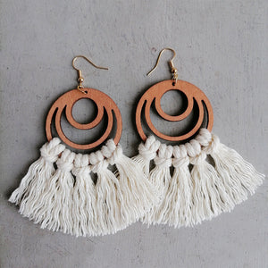 Macrame tassel and wood circle earrings in ivory with boho fringe detail.