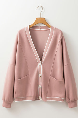 Dusty pink buttoned cardigan with white varsity trim and pockets.