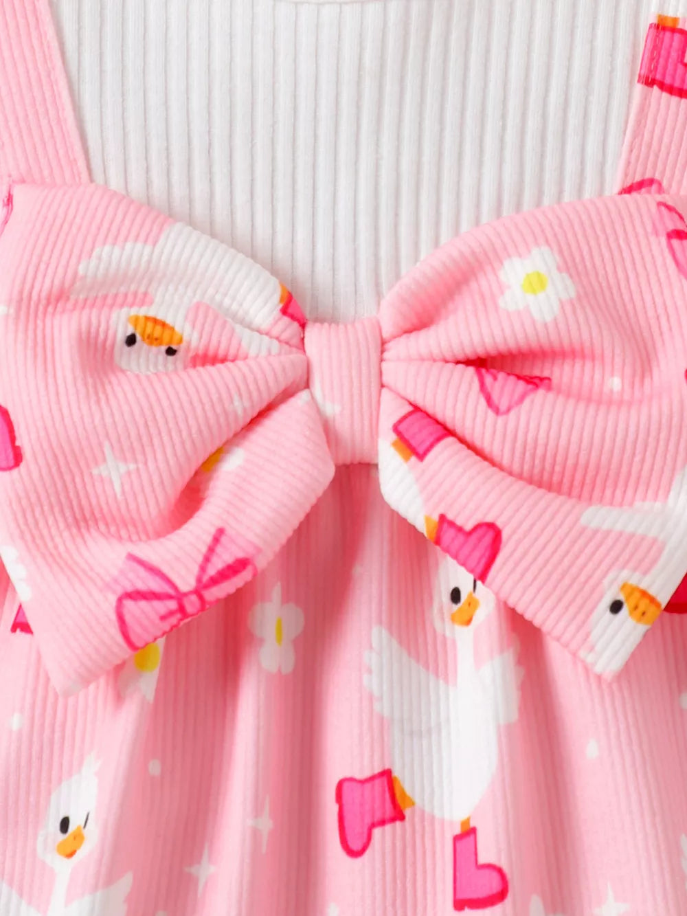 Children's Bow Duck Print Romper With Headband in Pink, model styling view