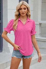 Hot Pink eyelet polo blouse with short puff sleeves and ruffled cuffs.