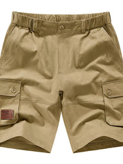Khaki chino shorts with elastic waist, button fly, and cargo pockets.