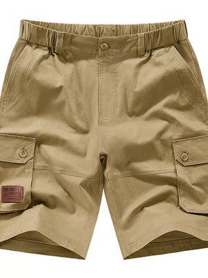Khaki chino shorts with elastic waist, button fly, and cargo pockets.