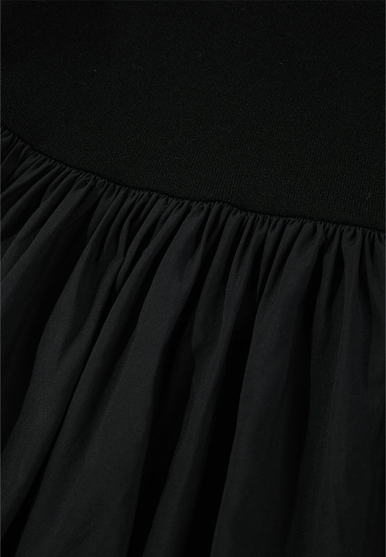 Black ribbed bodice peplum top with gathered chiffon skirt detail