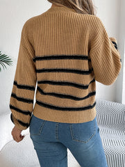 Caramel striped knit sweater with crew neck and balloon sleeves.