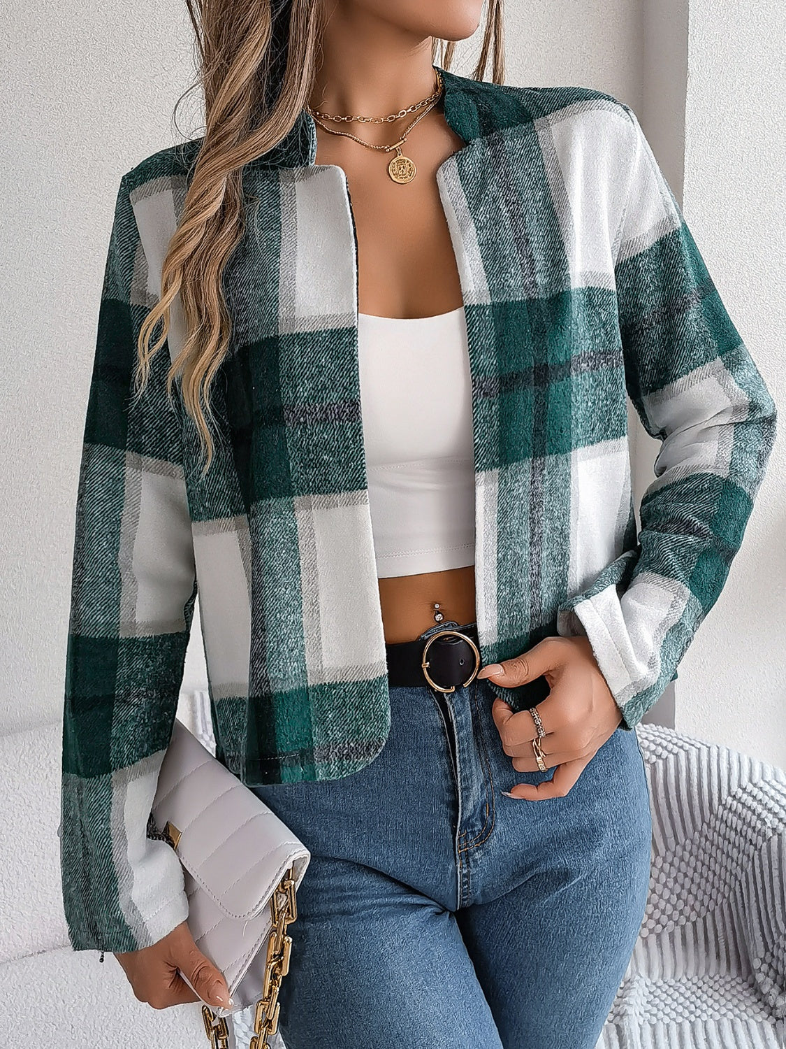 Collarless plaid cropped jacket in dark green and white, with a relaxed fit.