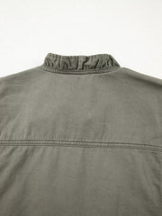 Ruffled collar denim vest in olive green cotton with button closure detail