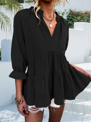 Black tiered linen blouse with ruffled sleeves and V-neck