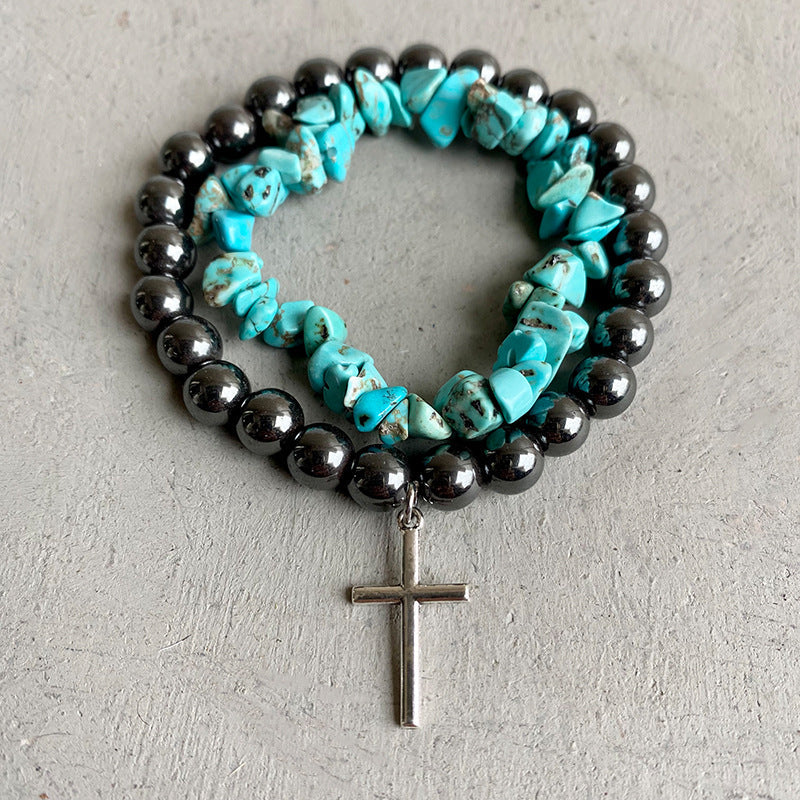 Hematite and turquoise stacked bracelets with silver cross charm