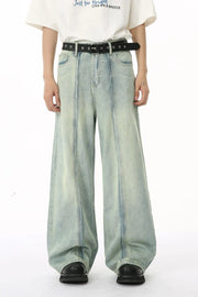 Light wash seamed palazzo denim trousers with a wide leg and casual styling.