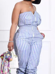 Blue striped strapless romper with pockets and button detail.