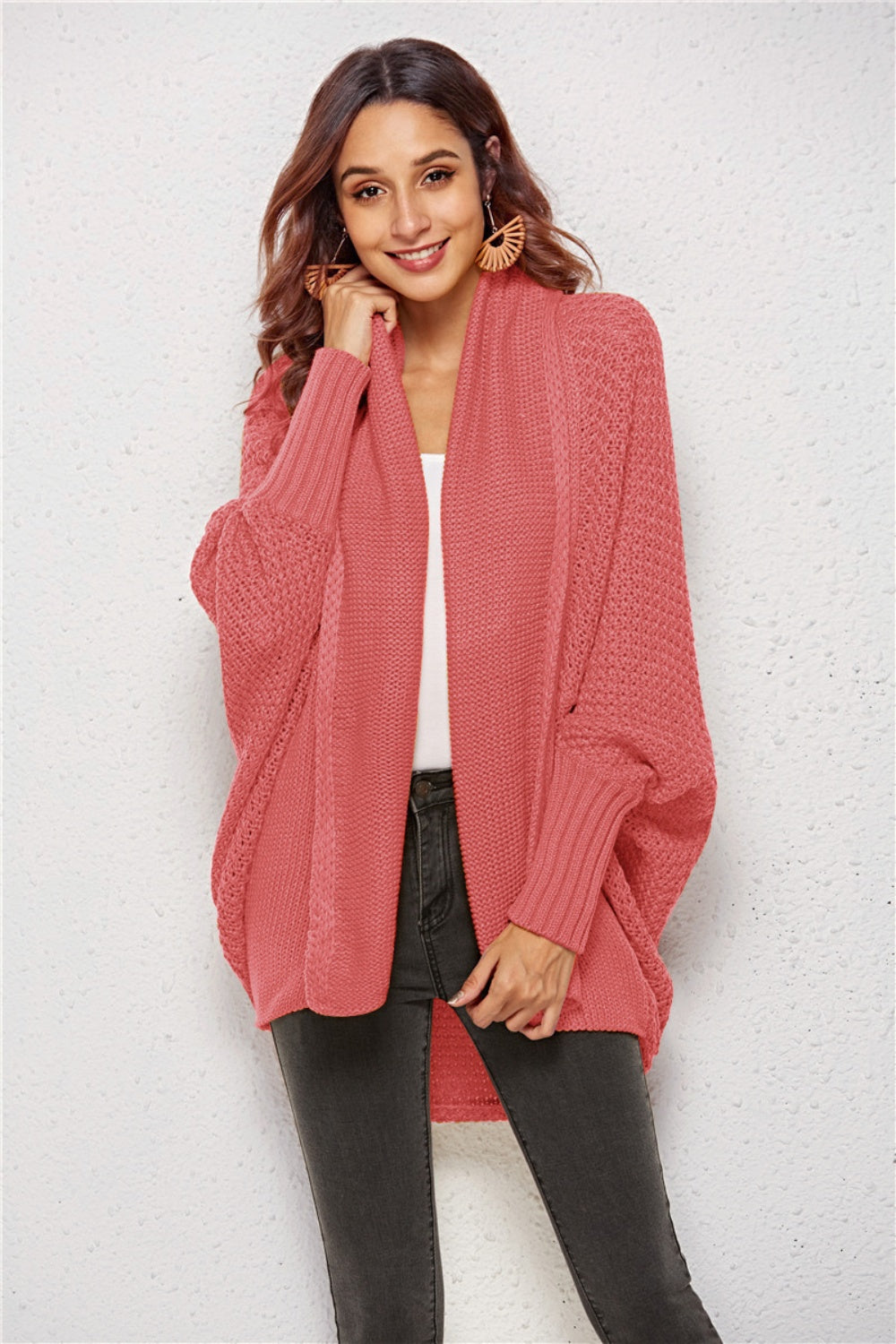 Cocoon knit cardigan in Rust with shawl collar, batwing sleeves, and open front.