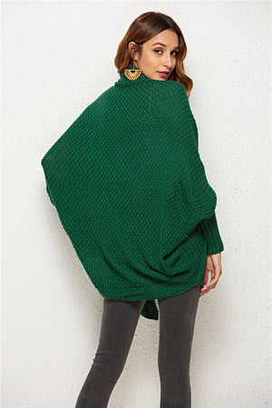Textured cocoon knit cardigan in dark green with batwing sleeves and a cowl neck.