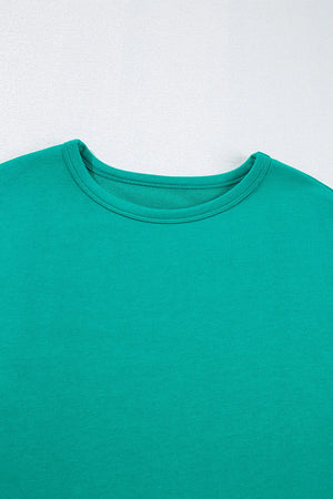 Turquoise crewneck sweatshirt with relaxed fit and crew neckline.