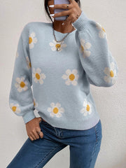Misty Blue knit sweater with puff sleeves and a daisy floral pattern.