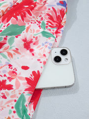 Floral print midi dress with tie shoulders, featuring a vibrant red and pink floral pattern.