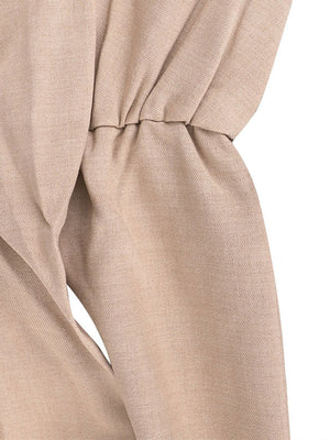 Beige halter neck wide leg jumpsuit with drawstring waist detail