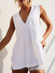 White wrap-front pocket tank top with a deep V-neck and sleeveless design.