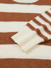 Patchwork drop shoulder sweater in caramel and cream stripes, acrylic fabric, ribbed cuffs.