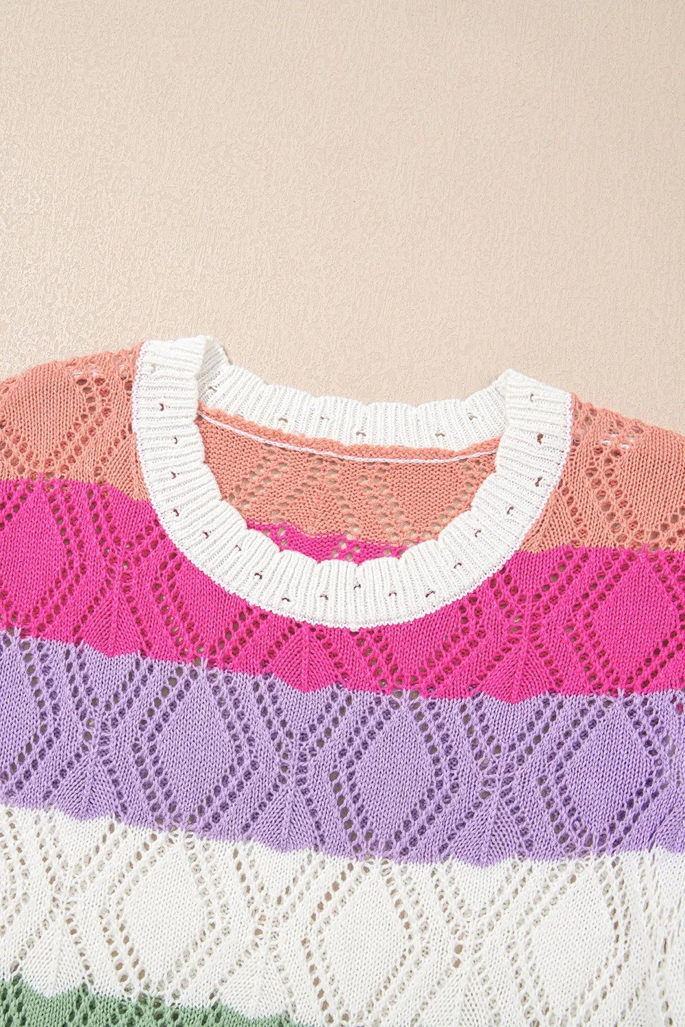 Crochet stripe blouse with scoop neck and flutter sleeves in acrylic.