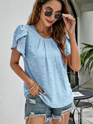 Blue textured puff sleeve blouse with dot pattern and pleated front.