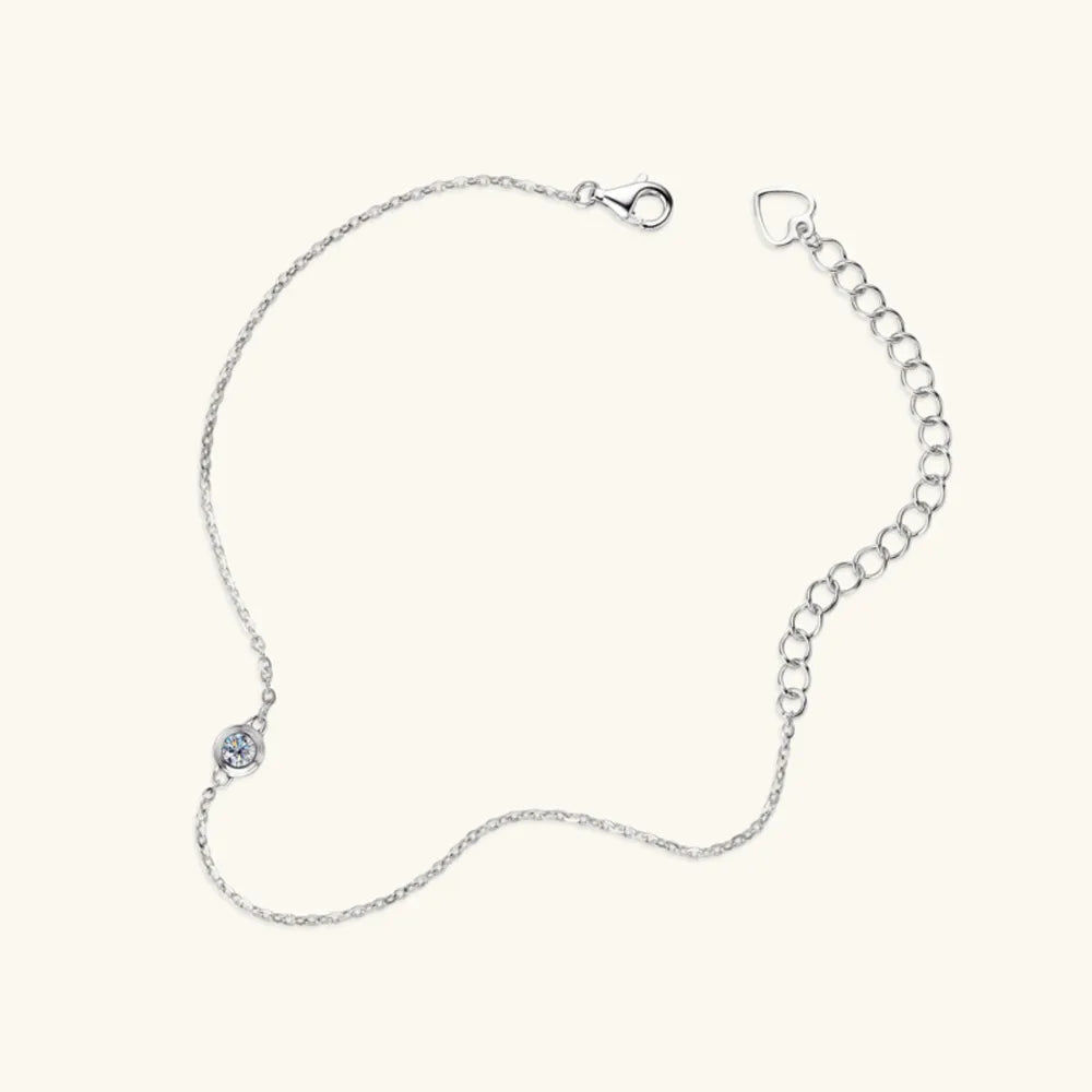 Silver moissanite solitaire chain bracelet with lobster clasp and extender chain.
