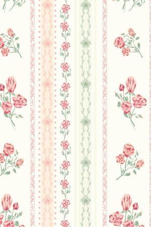 Pajama set in ivory with a cherry blossom print and striped accents.